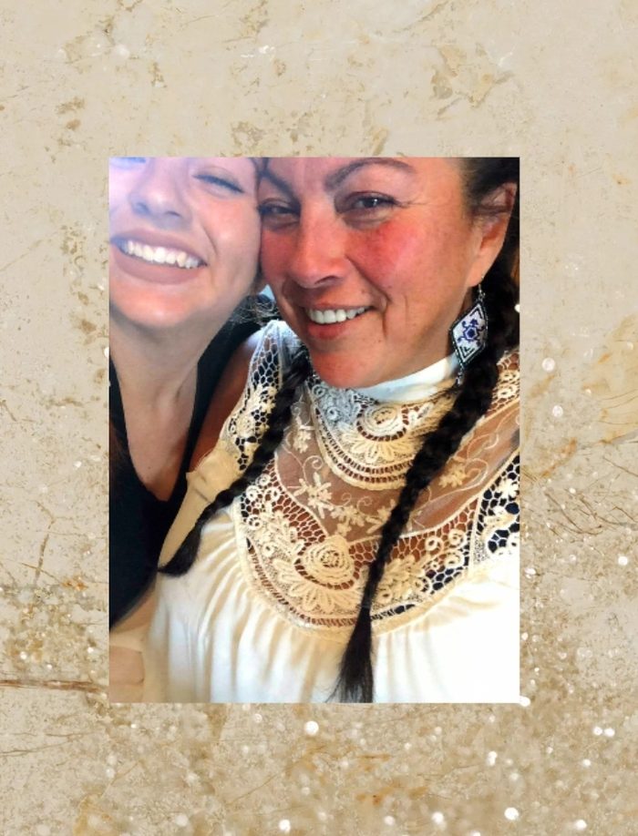 Denise with her daughter Sher, both smiling